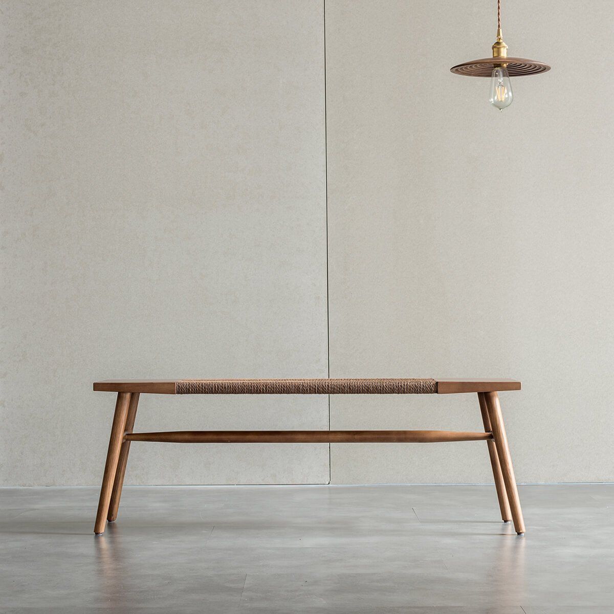 Front view of the Saro solid American ash bench with woven paper cord seat