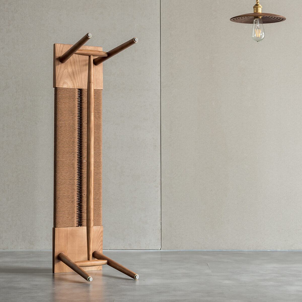 Underside view of the folded Saro solid American ash bench