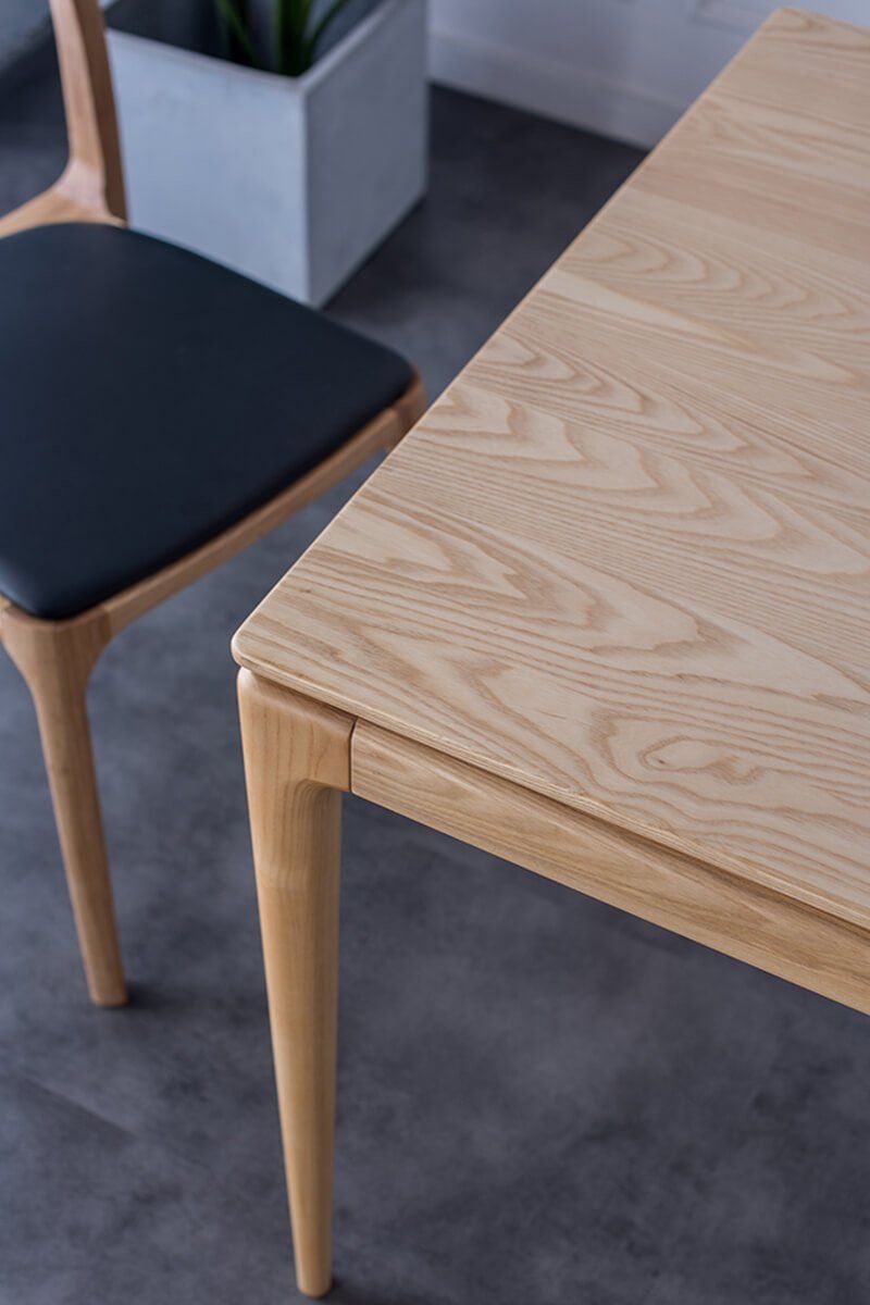 Light ash wood grain detail of Stockholm dining table