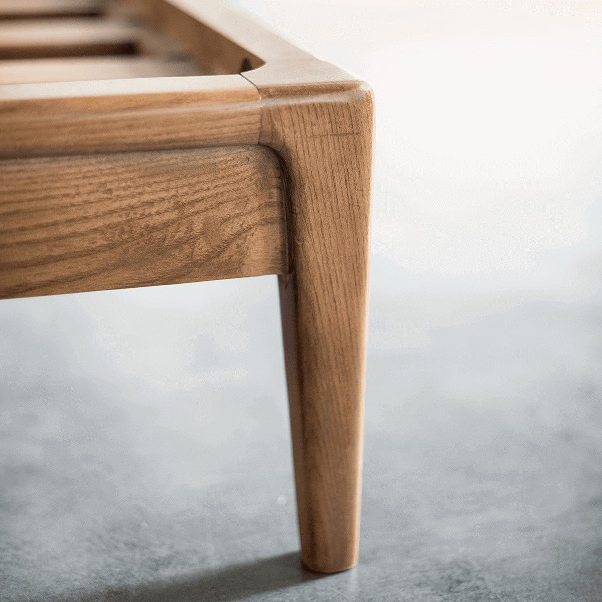 Solid American ash leg detail of the Stockholm Bed Frame