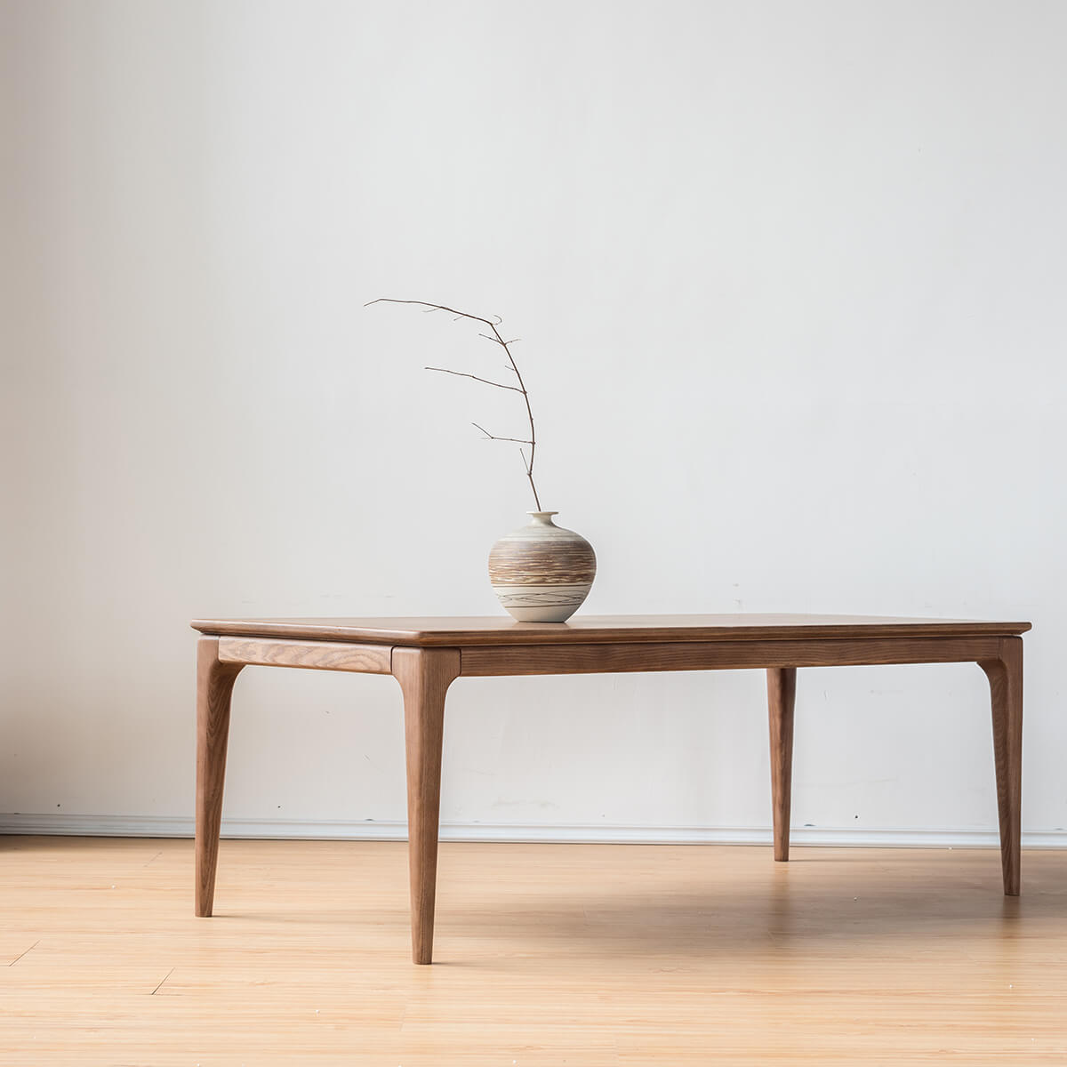 Stockholm solid ash coffee table in a minimalist living room