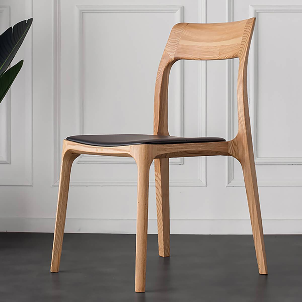 Visby stackable dining chairs in a Scandinavian-style interior