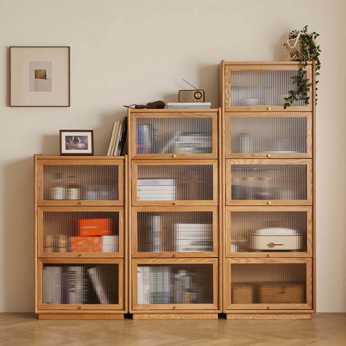 Multiple Winston solid oak cabinets arranged for display and storage